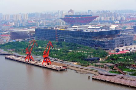 Photo taken on July 4, 2009 shows buildings under construction for the Shanghai 2010 World Expo in Shanghai, east China. The Shanghai 2010 World Expo is to open on May 1, 2010.