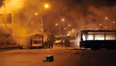 Rioters took to the street of Urumqi on Sunday evening.