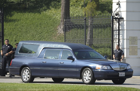 The hearse carring the body of Michael Jackson leaves the Forest Lawn cemetery in Los Angeles on July 7, 2009. A star-studded public tribute to Michael Jackson was held at the Staples Center in LA Tuesday with thousands of randomly selected fans joining family and friends to bid farewell to the King of Pop.