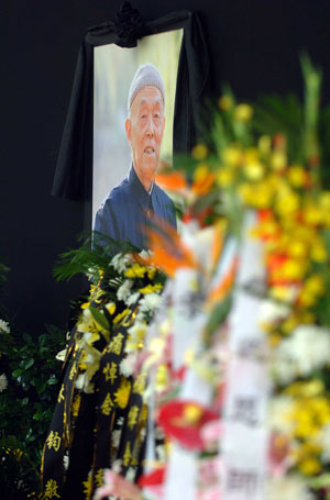 A large portrait of renowned Chinese scholar Ji Xianlin is shown in a mourning hall set up at Peking University in Beijing on July 12, 2009.