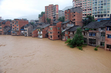 Photo taken on July 12, 2009 shows the flooded streets at the Nanba Town of Yihan County in Dazhou City, southwest China&apos;s Sichuan Province.