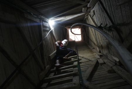 A Palestinian works in a tunnel in Rafah, southern Gaza Strip, on the border with Egypt, on July 19, 2009. A total of 115 people have been killed in the tunnels since Israel imposed the blockade on Gaza two years ago.