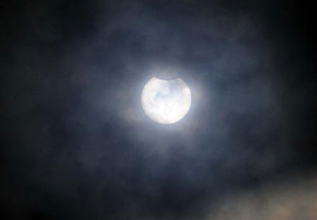 Solar eclipse is seen in Lanzhou, capital of northwest China's Gansu Province, on July 22, 2009.