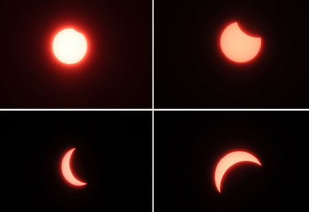 Combo photograph taken at 8:30 AM (L, Upper), 8:50 AM (R, Upper), 9:25 (L, Bottom) and 9:50 (R, Bottom) on July 22, 2009 shows the process of the solar eclipse seen in Jinan, capital of east China's Shandong Province.