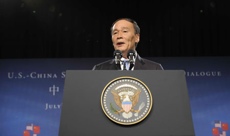 Chinese Vice Premier Wang Qishan delivers a speech during the opening ceremony of the China-U.S. Strategic and Economic Dialogue (S&ED) in Washington, the United States, July 27, 2009. 