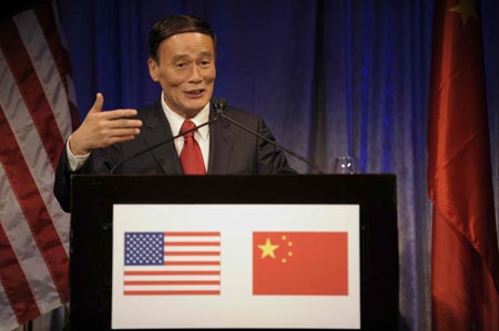 Chinese Vice Premier Wang Qishan delivers a speech during a welcoming reception held by United States friendly groups at Ritz Carlton Hotel in Washington D.C., capital of the United States, on July 28, 2009. Wang Qishan was in Washington to attend the first round of the China-US Strategic and Economic Dialogue.