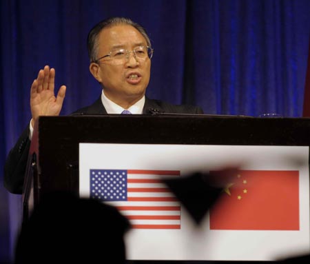 Chinese State Councilor Dai Bingguo delivers a speech during a welcoming reception held by United States friendly groups at Ritz Carlton Hotel in Washington D.C., capital of the United States, on July 28, 2009.