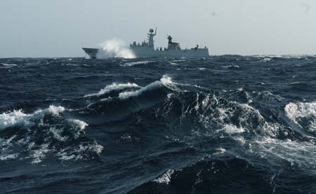 Chinese naval &apos;Xuzhou&apos; missile frigate sails in the roaring Arabian sea, the Indian Ocean on July 28, 2009.