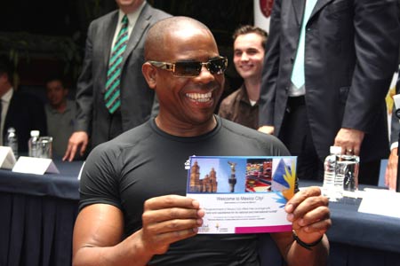 A tourist displays his facilitated meidcal card in Mexico City, Mexico, on July 28, 2009. The Mexican government on Tuesday issued facilitated meidcal cards to 10 tourists who could receive flu prevention mesures, treatments and emergency relief with little payments. 