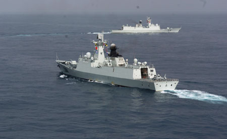 Zhoushan and Xuzhou (front) missile frigates change directions to join the Second Chinese naval escort on the Gulf of Aden, on July 30, 2009. Two frigates and a supply ship from the Chinese navy, on another escort mission to fend off Somali pirates, joined with the second naval escort on Thursday.