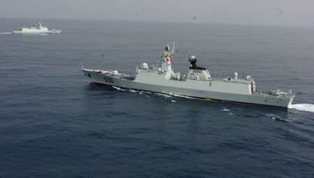 Zhoushan and Xuzhou (front) missile frigates change directions to join the Second Chinese naval escort on the Gulf of Aden, on July 30, 2009. Two frigates and a supply ship from the Chinese navy, on another escort mission to fend off Somali pirates, joined with the second naval escort on Thursday.