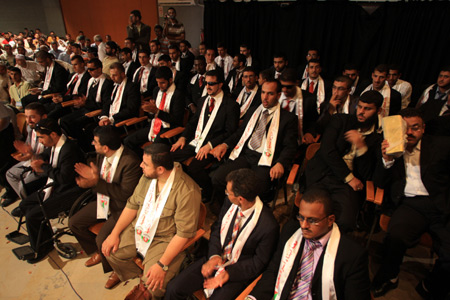 Blind Palestinian grooms are seen during their collective wedding party which involved 80 grooms and brides in Gaza city on August 2, 2009.