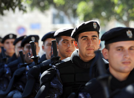 Palestinian policemen guard near the assembly place of the sixth congress of the Palestinian Fatah movement in the West Bank city of Bethlehem, on August 4, 2009. Some 4,200 policemen and security officers have been deployed in Bethlehem during the three-day conference meetings which kicked off on Tuesday morning.