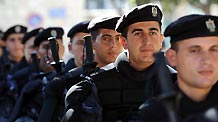 Palestinian policemen guard near the assembly place of the sixth congress of the Palestinian Fatah movement in the West Bank city of Bethlehem, on August 4, 2009. Some 4,200 policemen and security officers have been deployed in Bethlehem during the three-day conference meetings which kicked off on Tuesday morning.