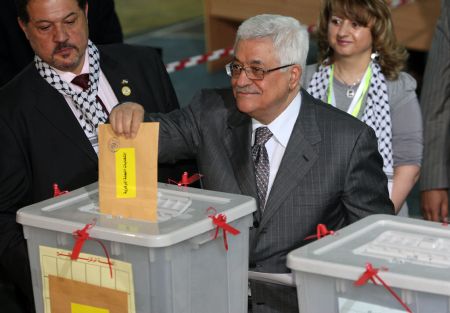 Palestinian National Authority Chairman, leader of the Fatah movement, Mahmoud Abbas casts his vote at Tarasanta School, in the West Bank city of Bethlehem, on August 9, 2009.