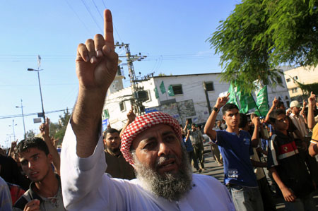 Palestinians attend the funeral of the Hamas security forces killed in gunbattles with an Islamic redical group in Rafah, southern Gaza Strip, on August 15, 2009.