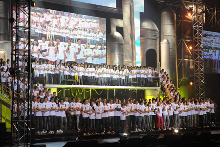 Actors perform a group song during a charity fundraising soiree in Hong Kong, China, on August 17, 2009.