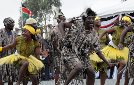 Kenyan dance during the start-working ceremony of a road which will be built by Chinese company in Nairobi, capital of Kenya, Aug. 21, 2009. China will give technical and financial support to the road that around Nairobi, the first main road in Nairobi.