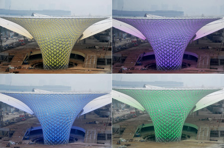 The combo photo taken on Aug. 31, 2009 shows the Sun Valley of the World Expo Axis lit up for trial in Shanghai, east China. (Xinhua Photo)