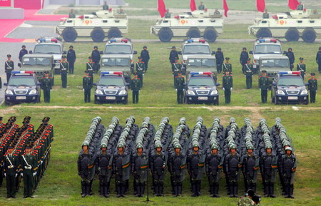 A photo taken on September 1 shows armed police forces in Beijing line up for a mobilization ceremony.