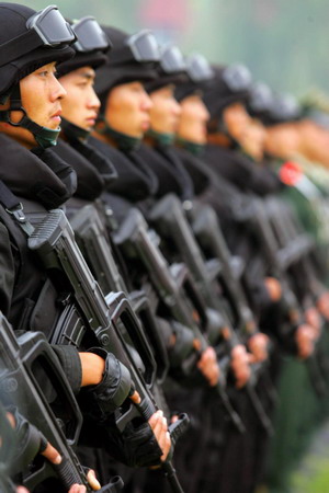 A photo taken on September 1 shows armed police forces in Beijing lining up for a mobilization ceremony that marks the start of their deployment in the city to ensure security during the National Day celebrations on October 1 that mark the 60th anniversary of the founding of the People's Republic of China.