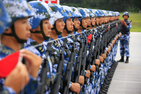 Photo taken on August 21, 2009 shows Chinese soldiers take part in the parade training in Beijing, capital of China. Participants are busy doing exercises to prepare for the scheduled military parade at the Tian&apos;anmen square in Beijing to celebrate the 60th anniversary of the founding of the People&apos;s Republic of China on October 1. 