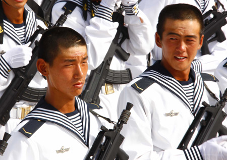 Photo taken on June 28, 2009 shows Chinese soldiers take part in the parade training in Beijing, capital of China. 