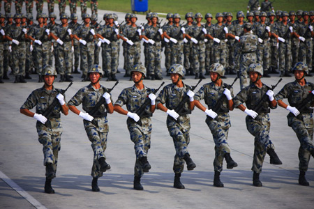 Photo taken on August 10, 2009 shows members of airborne troops take part in the parade training in Beijing, capital of China. 