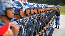 Photo taken on August 21, 2009 shows Chinese soldiers take part in the parade training in Beijing, capital of China. Participants are busy doing exercises to prepare for the scheduled military parade at the Tian'anmen square in Beijing to celebrate the 60th anniversary of the founding of the People's Republic of China on October 1.