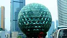 Photo taken on September 5, 2009 shows a giant crystal ball made of 3,120 glasses with a weight of 117 tons at Youhao square in Dalian, northeast China's Liaoning Province.