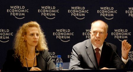 World Economic Forum (WEF) senior economist and director and head of Global Competitiveness Network Jannifer Blanke (L) listens to Robert Greenhill, managing director and Chief Business Officer of WEF during a press conference at the Annual Meeting of the New Champions 2009 in Dalian, northeast China's Liaoning Province, September 10, 2009. 