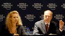 World Economic Forum (WEF) senior economist and director and head of Global Competitiveness Network Jannifer Blanke (L) listens to Robert Greenhill, managing director and Chief Business Officer of WEF during a press conference at the Annual Meeting of the New Champions 2009 in Dalian, northeast China's Liaoning Province, September 10, 2009.