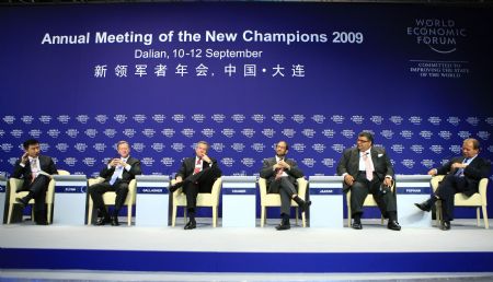 Participants discuss at a forum focusing on the basis of new social compact at the Annual Meeting of the New Champions 2009, or Summer Davos, in Dalian, northeast China's Liaoning Province, September 10, 2009. 