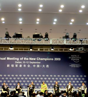 Participants attend a forum focusing on the global downturn and the developing world at the Annual Meeting of the New Champions 2009 in Dalian, northeast China's Liaoning Province, September 10, 2009.