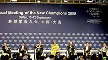 Participants attend a forum focusing on the global downturn and the developing world at the Annual Meeting of the New Champions 2009 in Dalian, northeast China's Liaoning Province, September 10, 2009.