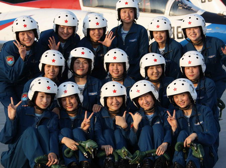 Sixteen female pilots pose for a group picture at an airport in Beijing, China, in this photo taken on July 14.