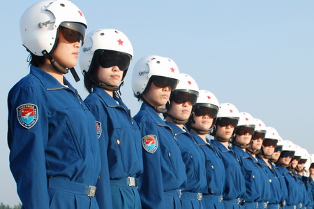 Female pilots line up before training starts at an airport in Beijing, China, in this photo taken on July 14.