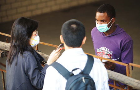 An overseas student is interviewed at Heilongjiang University in Harbin, capital of northeast China's Heilongjiang Province, September 16, 2009.