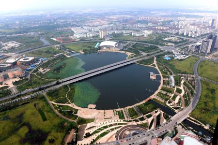 The aerial picture taken on September 19, 2009 shows the general view of Mingyue Lake of the new district of Yangzhou City, east China&apos;s Jiangsu Province.