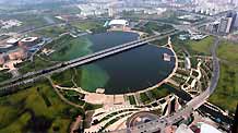 The aerial picture taken on September 19, 2009 shows the general view of Mingyue Lake of the new district of Yangzhou City, east China's Jiangsu Province.