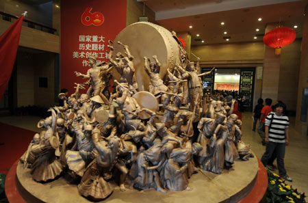 A work of art is on display during an exhibition of artworks reflecting China's major historical subjects since 1840, at the National Art Museum in Beijing, capital of China, on September 22, 2009.