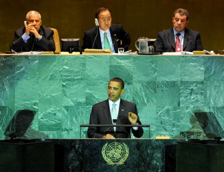 US President Barack Obama (F) addresses the opening ceremony of the United Nations Climate Change Summit at the UN headquarters in New York September 22, 2009.