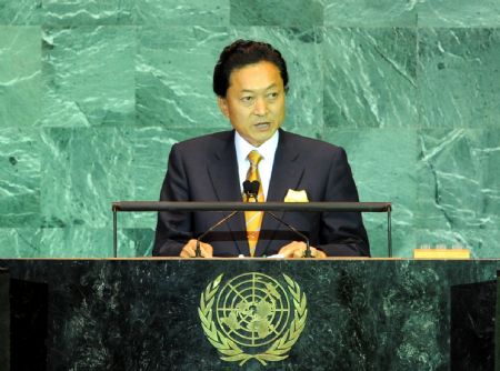 Japanese Prime Minister Yukio Hatoyama addresses the opening ceremony of the United Nations Climate Change Summit at the UN headquarters in New York September 22, 2009.