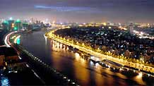 Photo taken on September 22, 2009 shows the night scene of Haihe River in Tianjin, China. Haihe River has been illuminated to welcome the 60th anniversary of the founding of People's Republic of China.