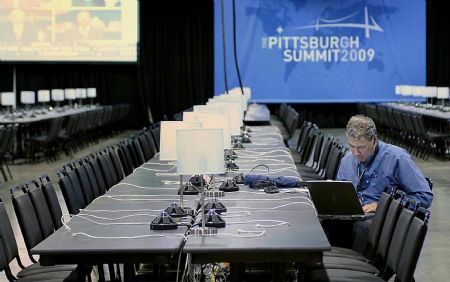 A journalist works in the press center of the David L. Lawrence Convention Center in Pittsburgh, the United States, September 22, 2009. 