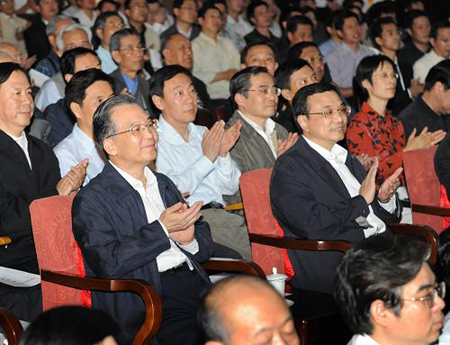 Department staff of China's State Council, the Cabinet, puts on a show Wednesday to celebrate the upcoming 60th founding anniversary of the People's Republic of China. 