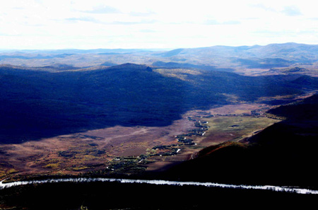 Aerial photo taken on September 23, 2009 shows the scenery of the Greater Khingan range in north China's Inner Mongolia Autonomous Region. The local eco-environment has witnessed a great improvement thanks to the local government's efforts to restore the eco-system. 