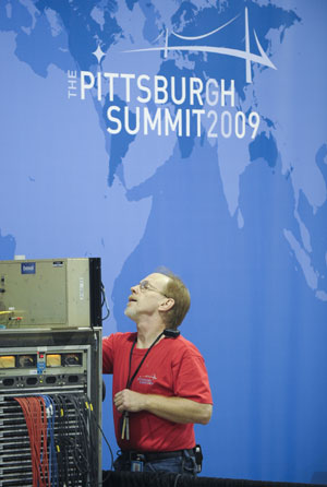 A technicist adjusts audio equipment at the news center of the upcoming Pittsburgh Summit 2009 of the Group of 20 (G20) nations, in Pittsburgh, the United States, September 22, 2009. The summit will be held on September1 24-25.