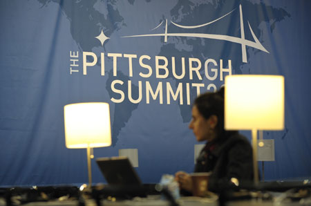 A reporter works at the news center of the upcoming Pittsburgh Summit 2009 of the Group of 20 (G20) nations, in Pittsburgh, the United States, September 23, 2009. The summit will be held on September 24-25.