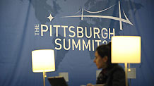 A reporter works at the news center of the upcoming Pittsburgh Summit 2009 of the Group of 20 (G20) nations, in Pittsburgh, the United States, September 23, 2009. The summit will be held on September 24-25.